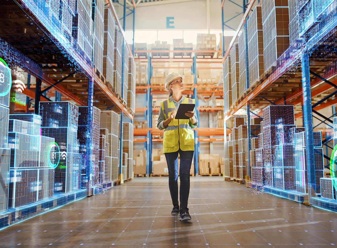 A person walking through a smart factory.
