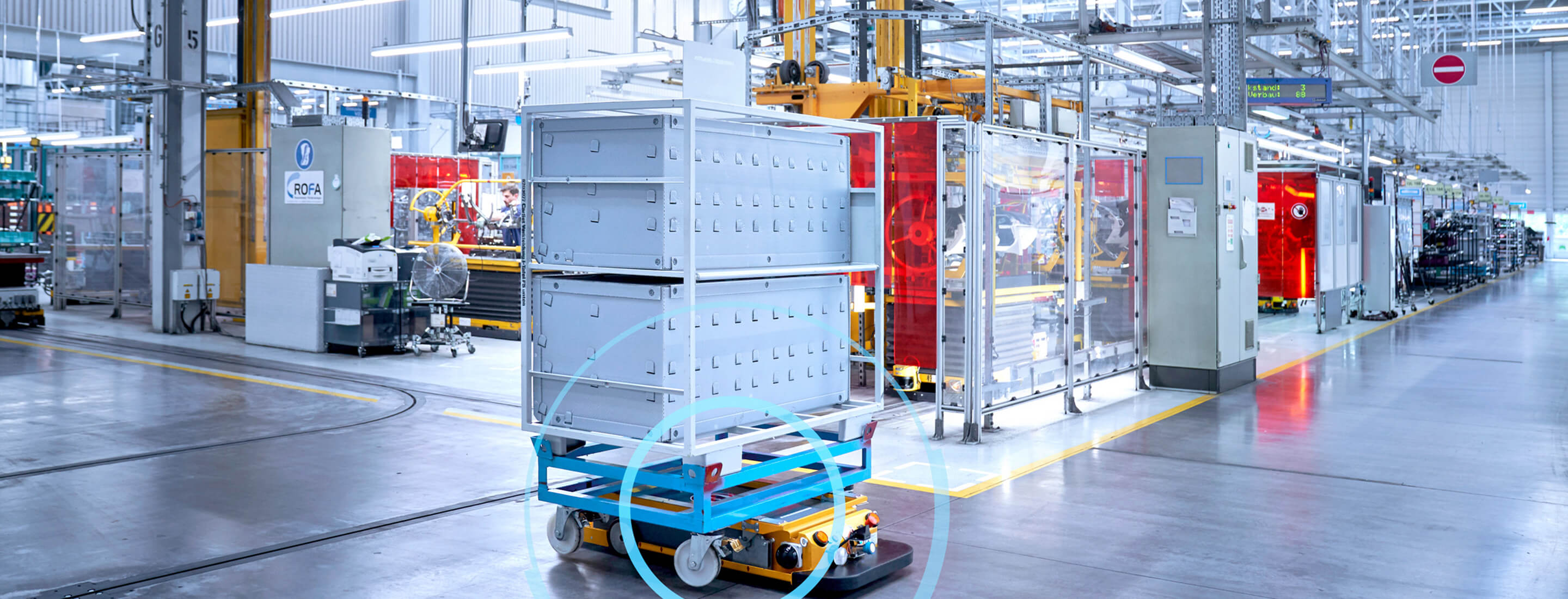 The hero image for the fleet manager page, showing an amr in a factory.